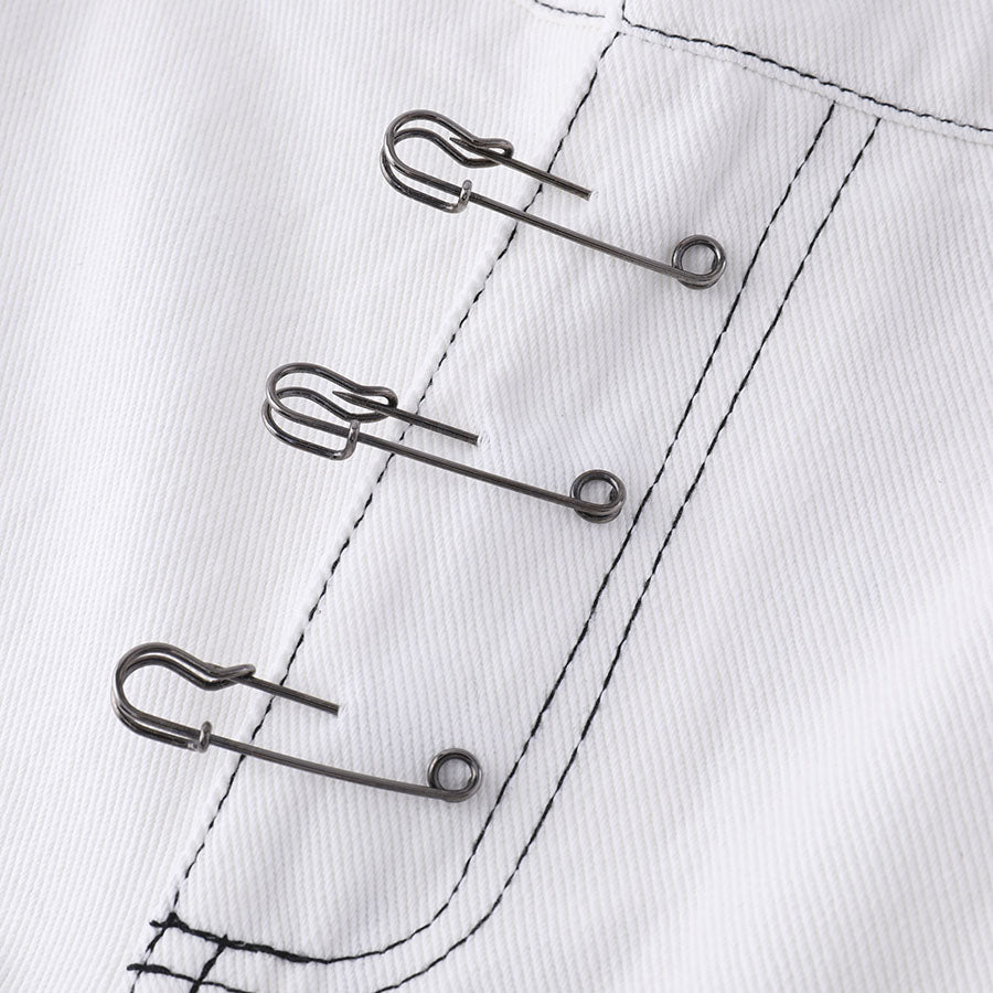 Jeans a catena strappati con ricamo Justnotag